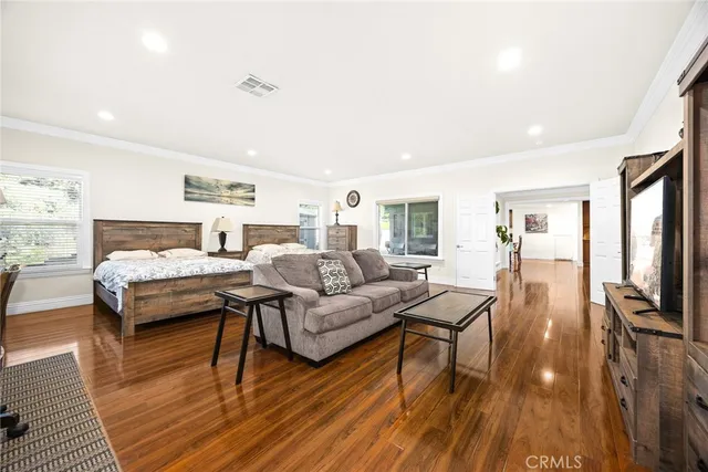 a bathroom with a granite countertop sink mirror and a bathtub