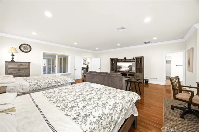 a bathroom with a tub a window and a shower