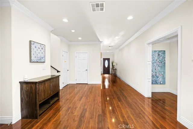 a bathroom with a tub shower and mirror