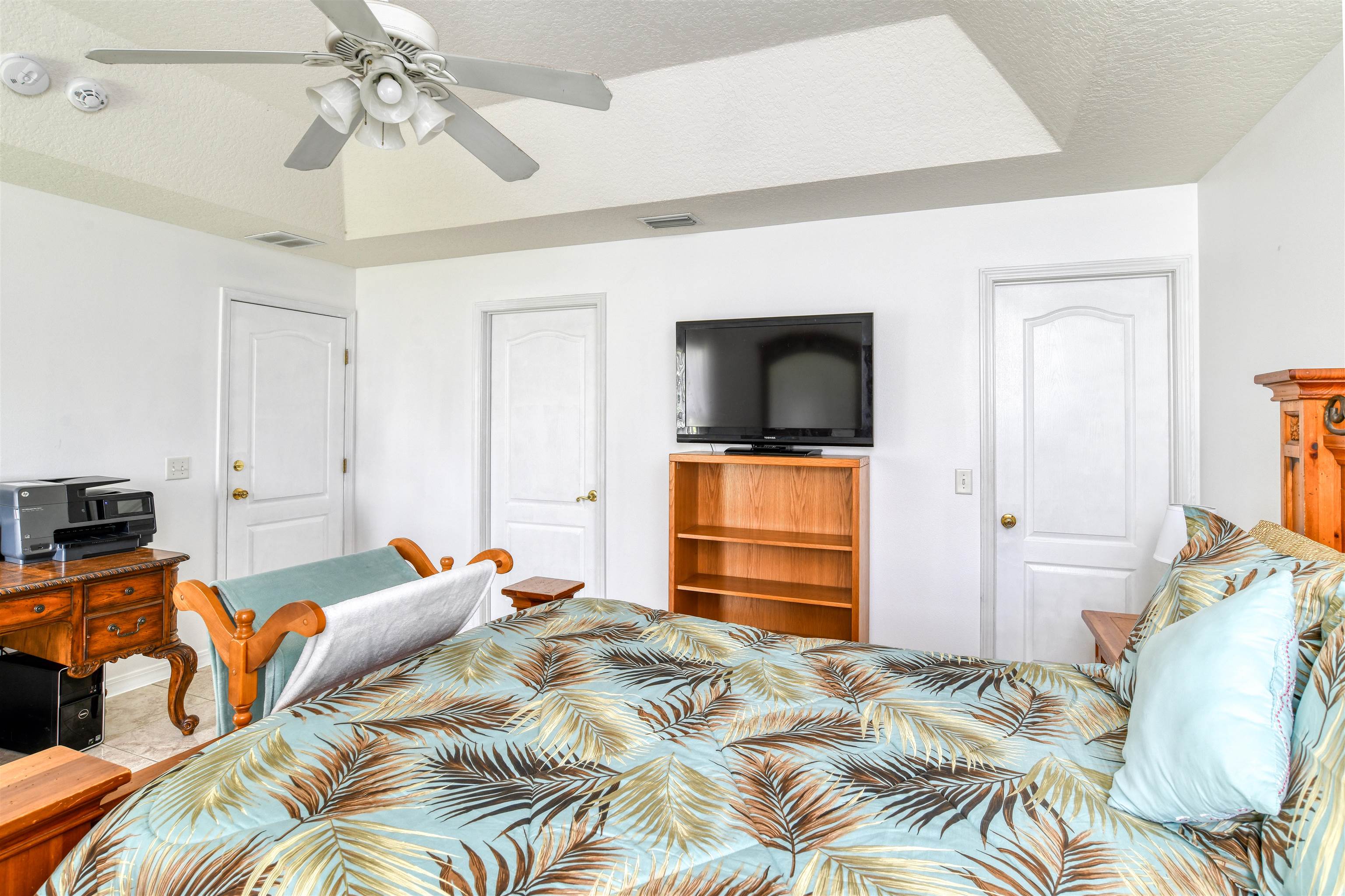 298 Ventura Road St. Augustine, FL 32080 - Photo 29 of 55 a bed room with a bed and a television