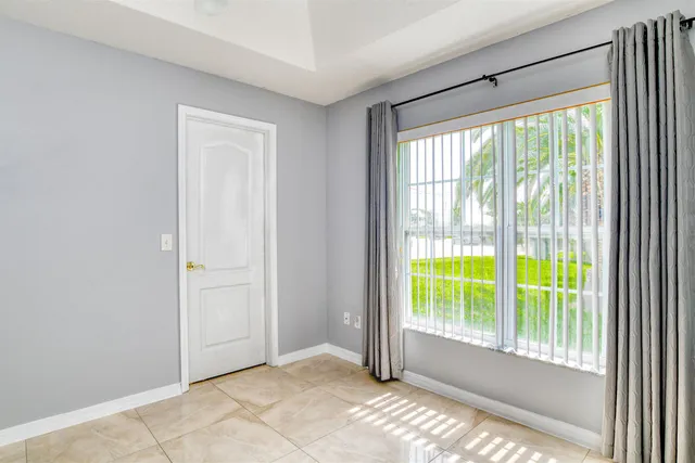 a view of an empty room and window