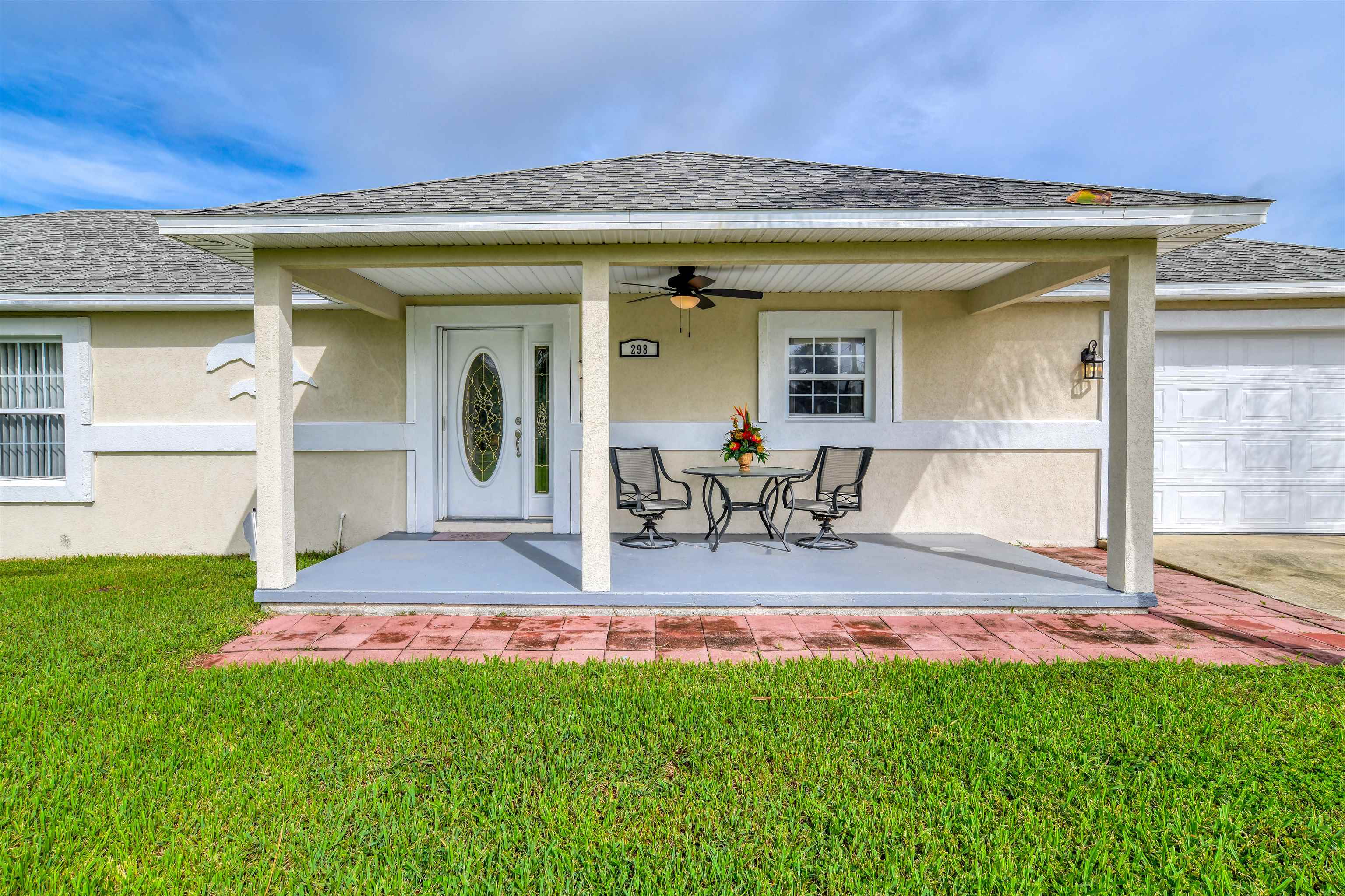 298 Ventura Road St. Augustine, FL 32080 - Photo 5 of 55 a view of a house with backyard porch and wooden fence