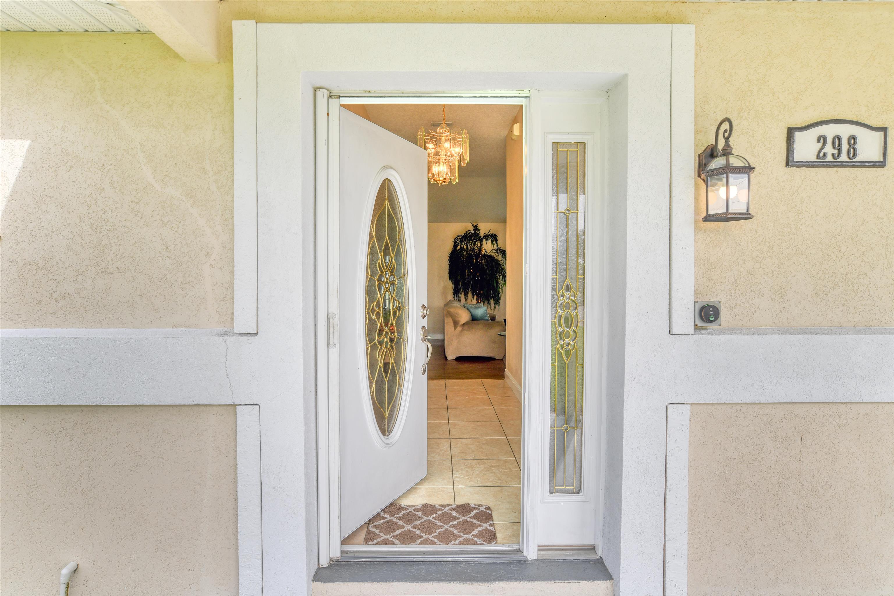 298 Ventura Road St. Augustine, FL 32080 - Photo 9 of 55 a view of a bathroom with mirror and door