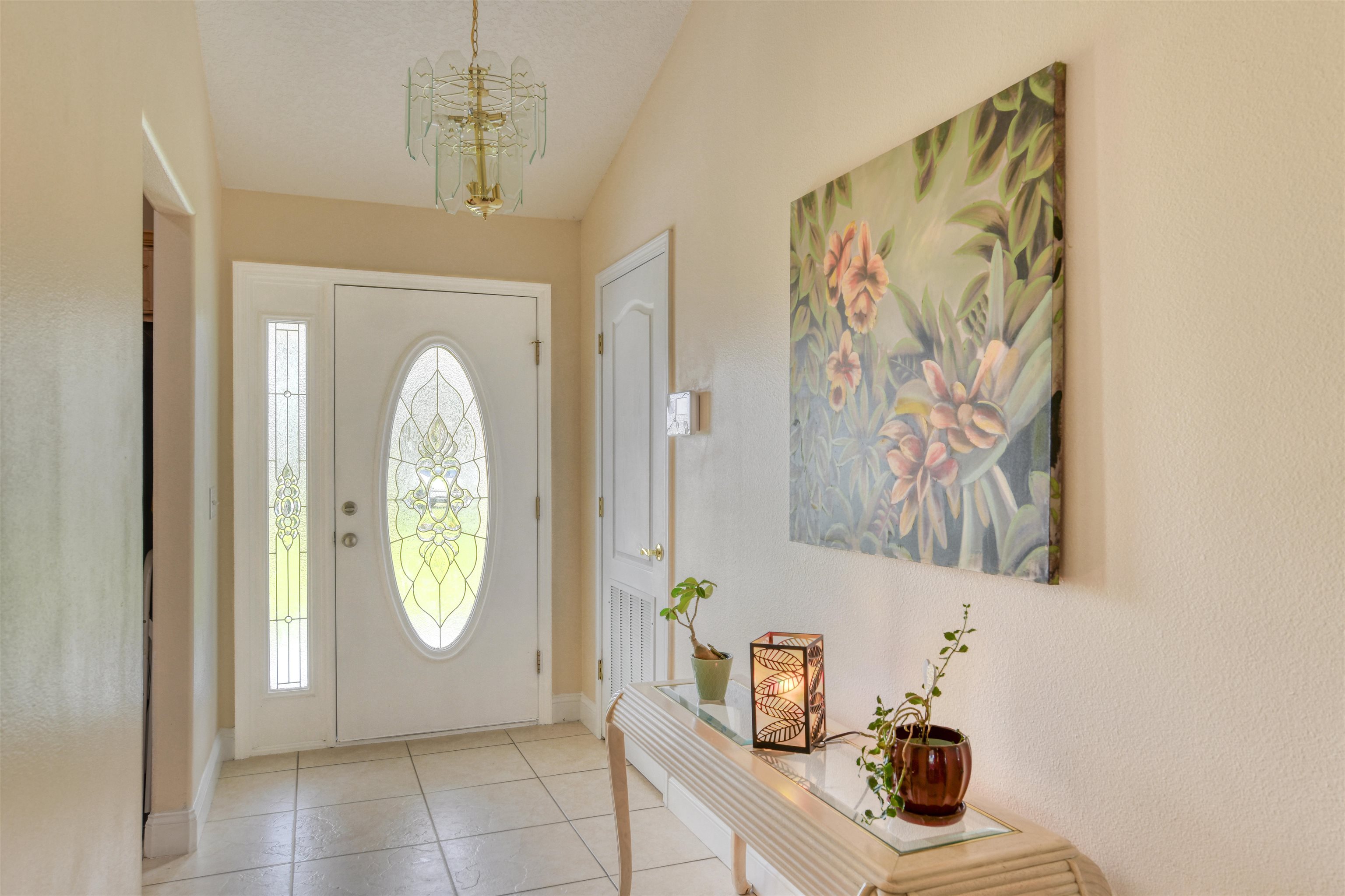 298 Ventura Road St. Augustine, FL 32080 - Photo 10 of 55 a view of a hallway with entryway and front door