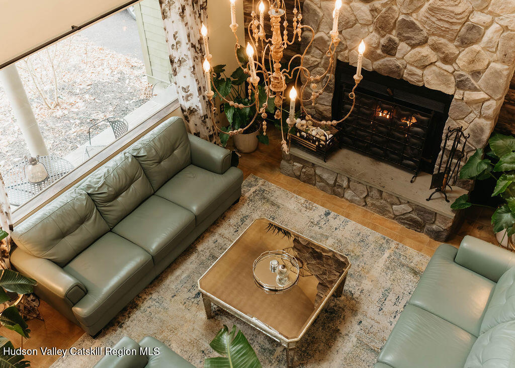 1 Rapp Hill Road New Paltz, NY 12561 - Photo 30 of 45 a living room with furniture and a fireplace