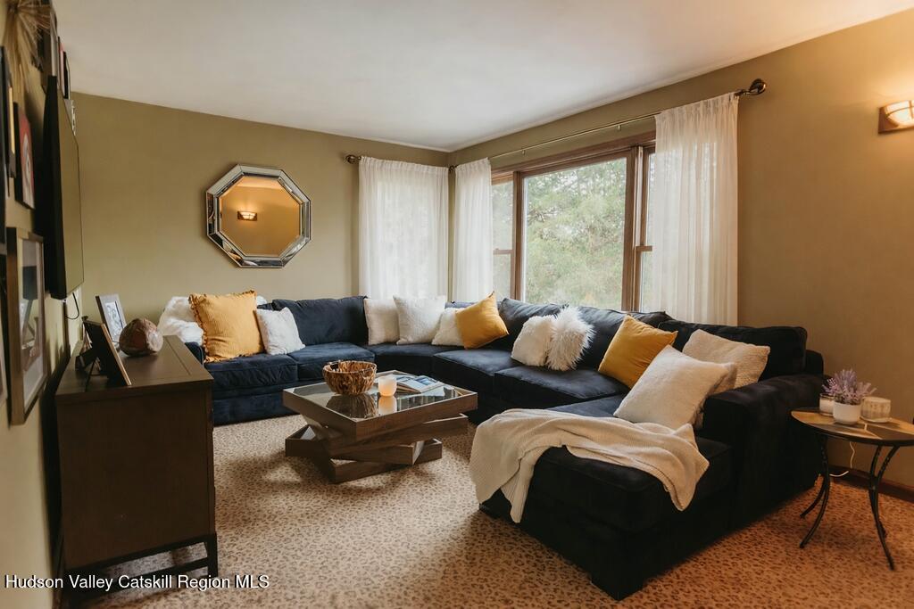 1 Rapp Hill Road New Paltz, NY 12561 - Photo 31 of 45 a living room with furniture and a window