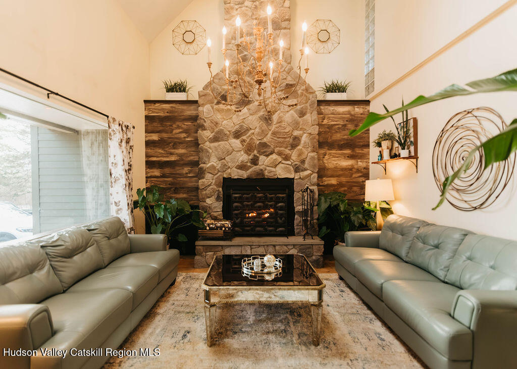 1 Rapp Hill Road New Paltz, NY 12561 - Photo 5 of 45 a living room with furniture and a fireplace