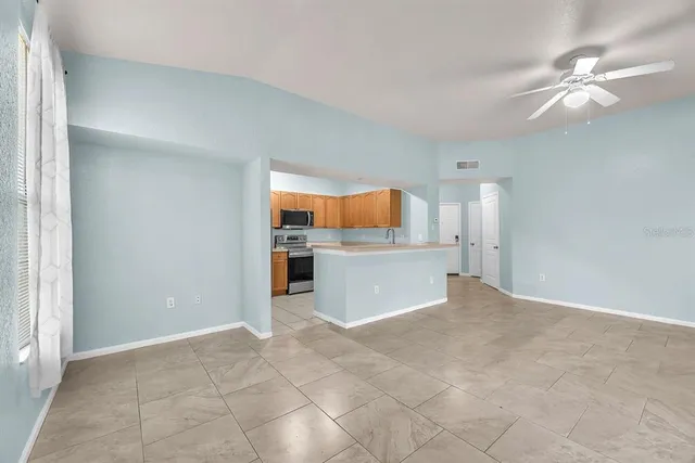 a view of a kitchen with a sink