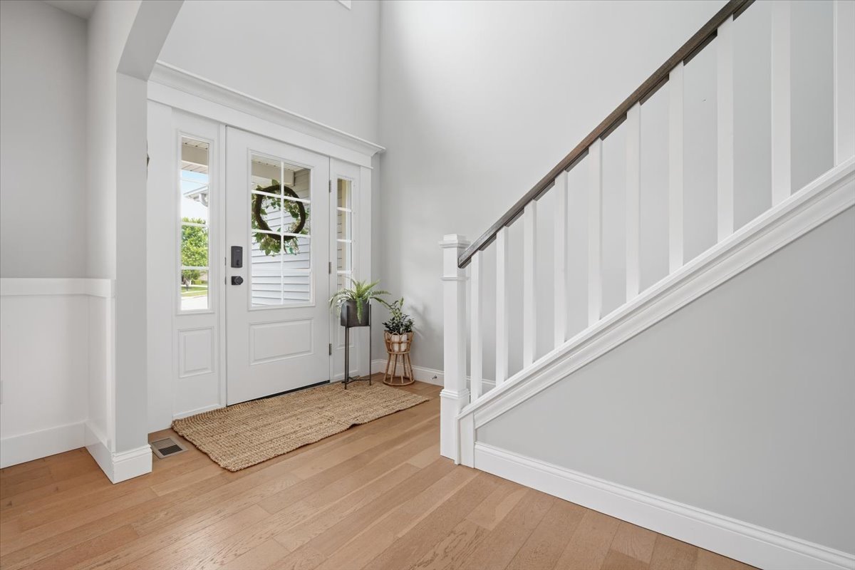 5407 Ferryman Road Bloomington, IL 61705 - Photo 3 of 61 a view of an entryway with wooden floor