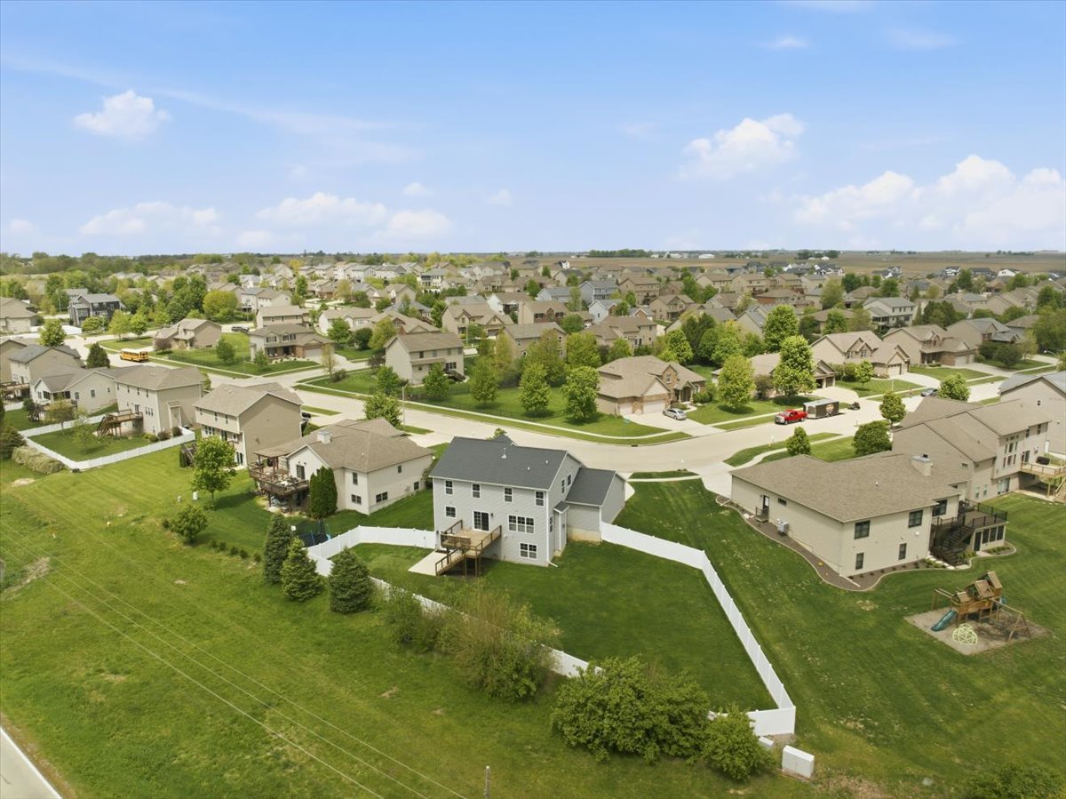 5407 Ferryman Road Bloomington, IL 61705 - Photo 53 of 61 an aerial view of residential houses with outdoor space and trees