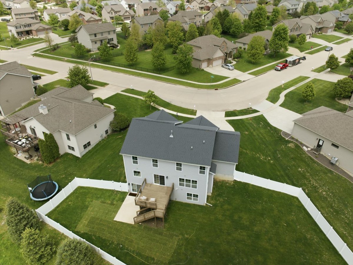 5407 Ferryman Road Bloomington, IL 61705 - Photo 54 of 61 an aerial view of a house with a garden