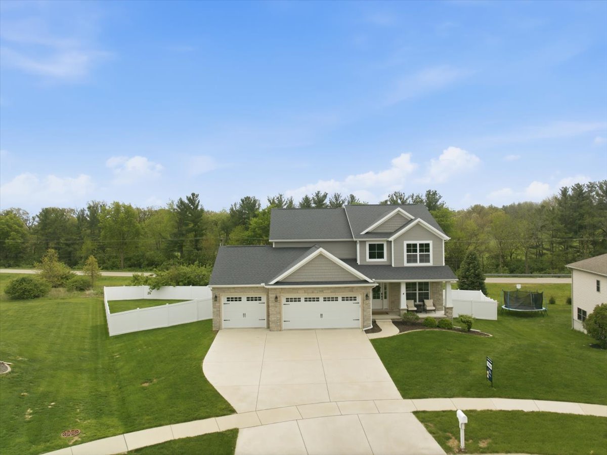 5407 Ferryman Road Bloomington, IL 61705 - Photo 56 of 61 a front view of a house with a yard
