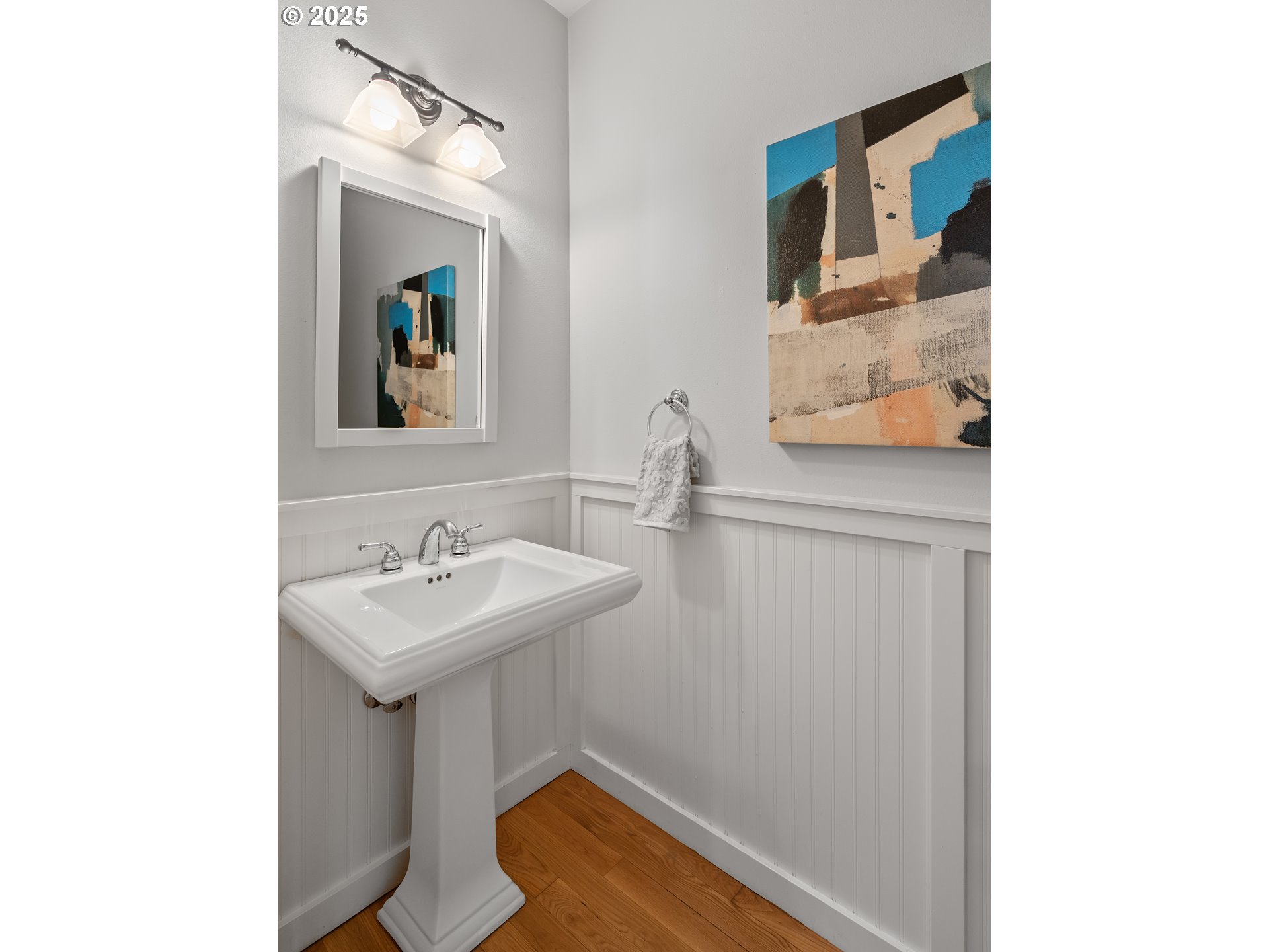 4646 North Commercial Avenue Portland, OR 97217 - Photo 16 of 31 a bathroom with a sink and a mirror