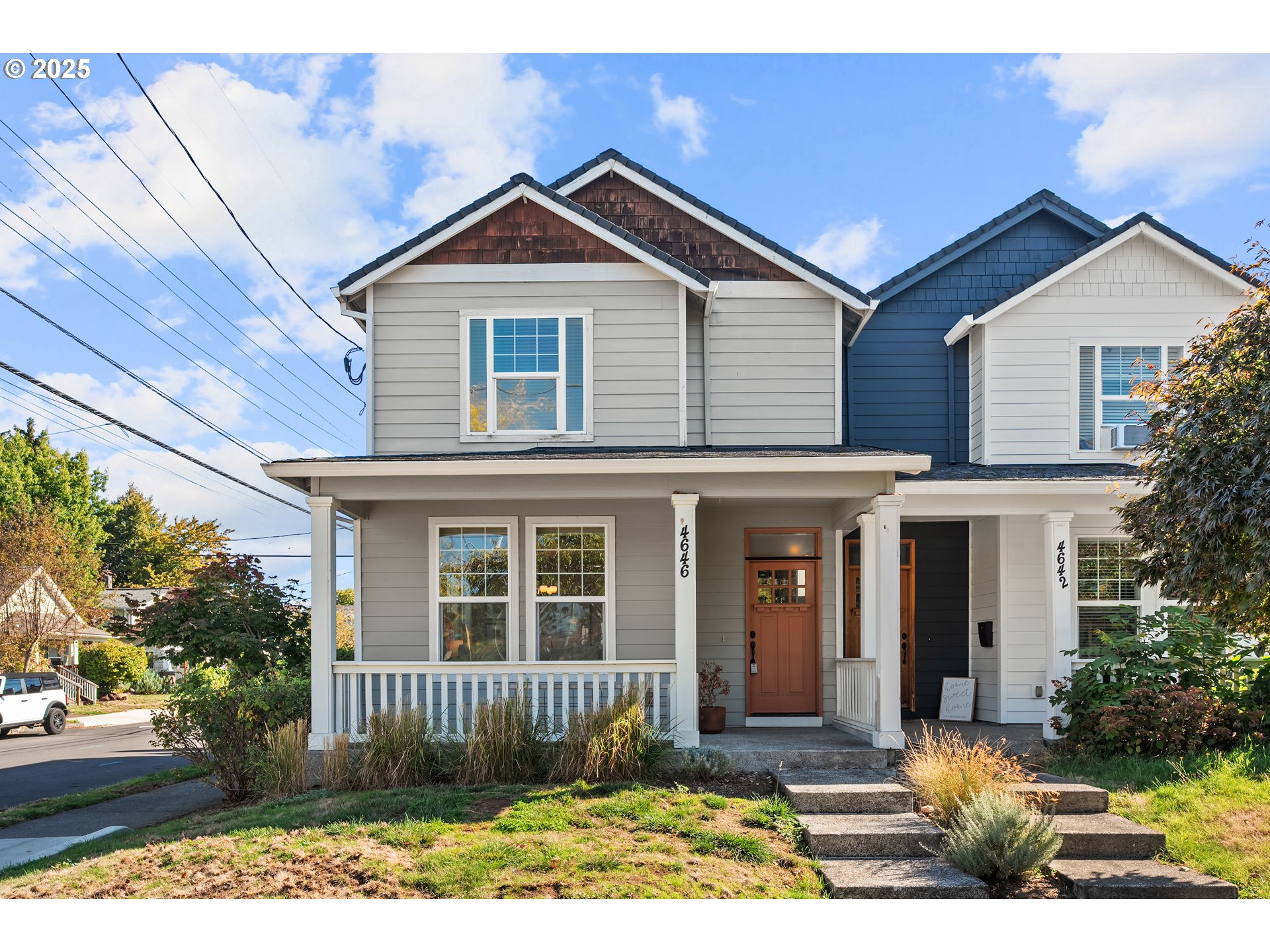 4646 North Commercial Avenue Portland, OR 97217 - Photo 2 of 31 a front view of a house with a yard