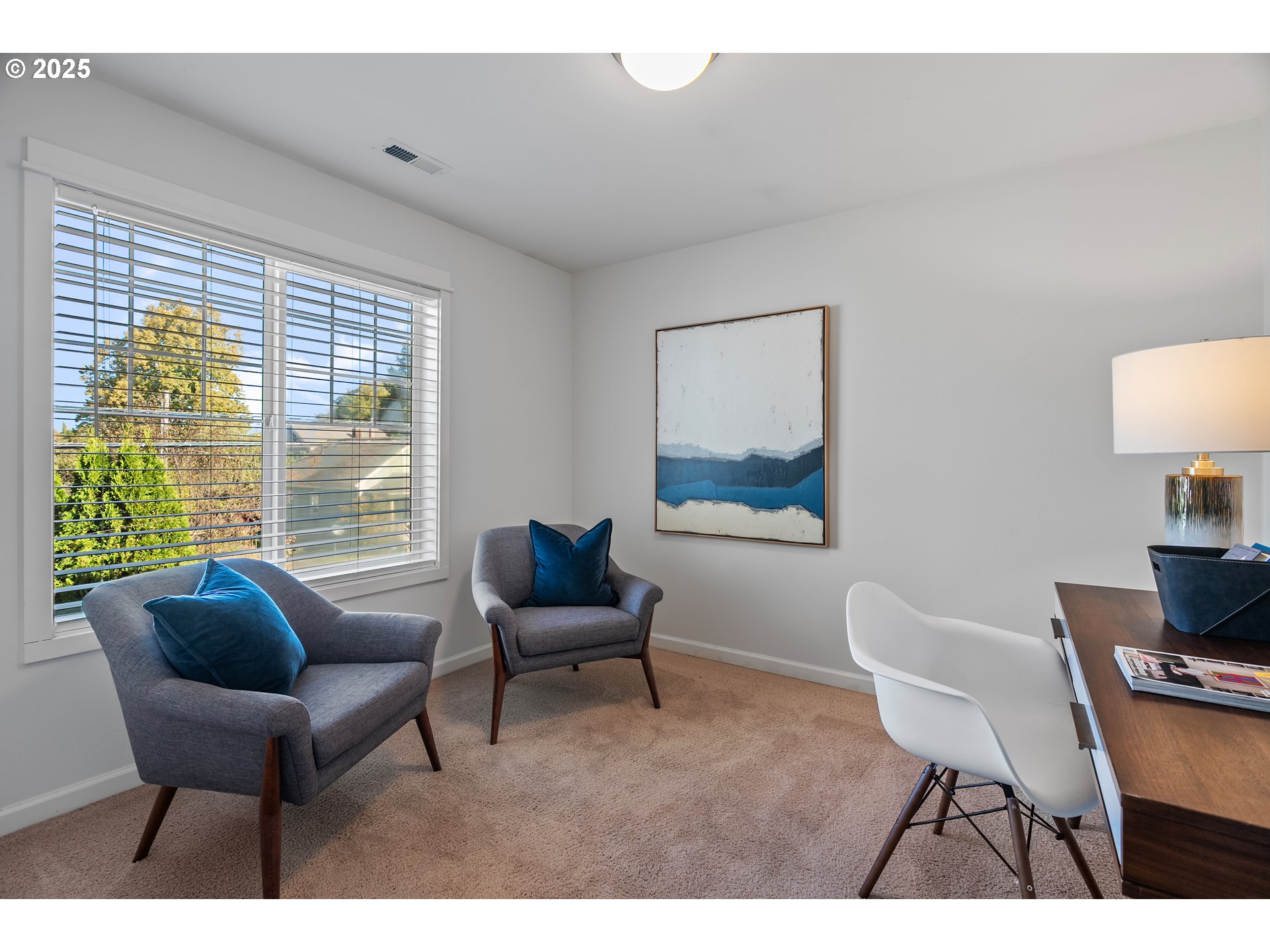 4646 North Commercial Avenue Portland, OR 97217 - Photo 23 of 31 a living room with furniture a lamp and a window
