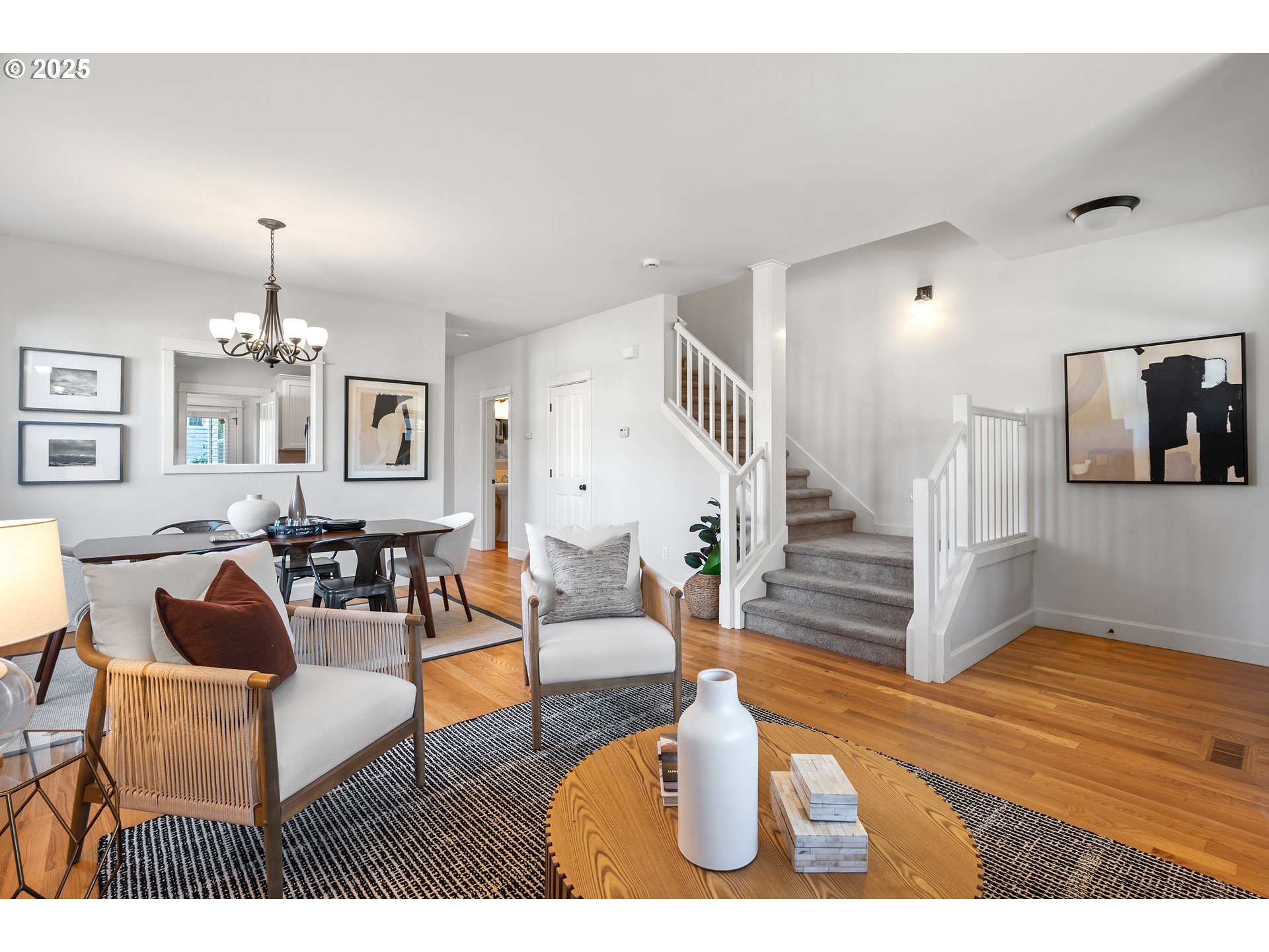 4646 North Commercial Avenue Portland, OR 97217 - Photo 7 of 31 a living room with furniture and a wooden floor