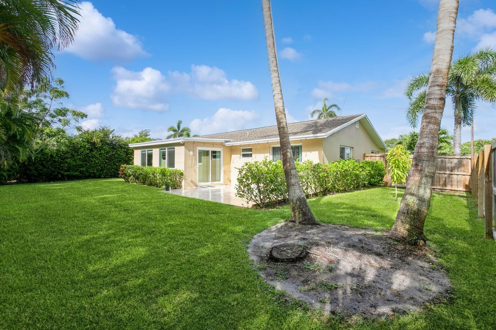 1615 Venus Avenue Jupiter, FL 33469 - Photo 1 of 27 22_Private Backyard