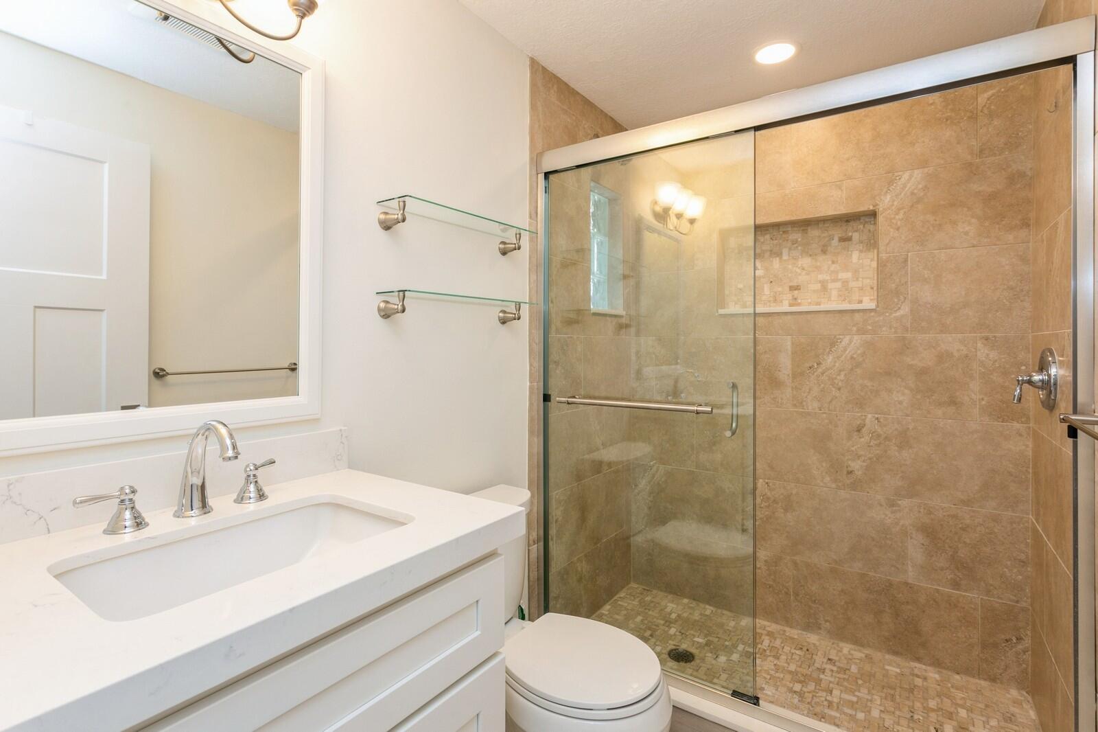 1615 Venus Avenue Jupiter, FL 33469 - Photo 20 of 27 19_Hall Bath