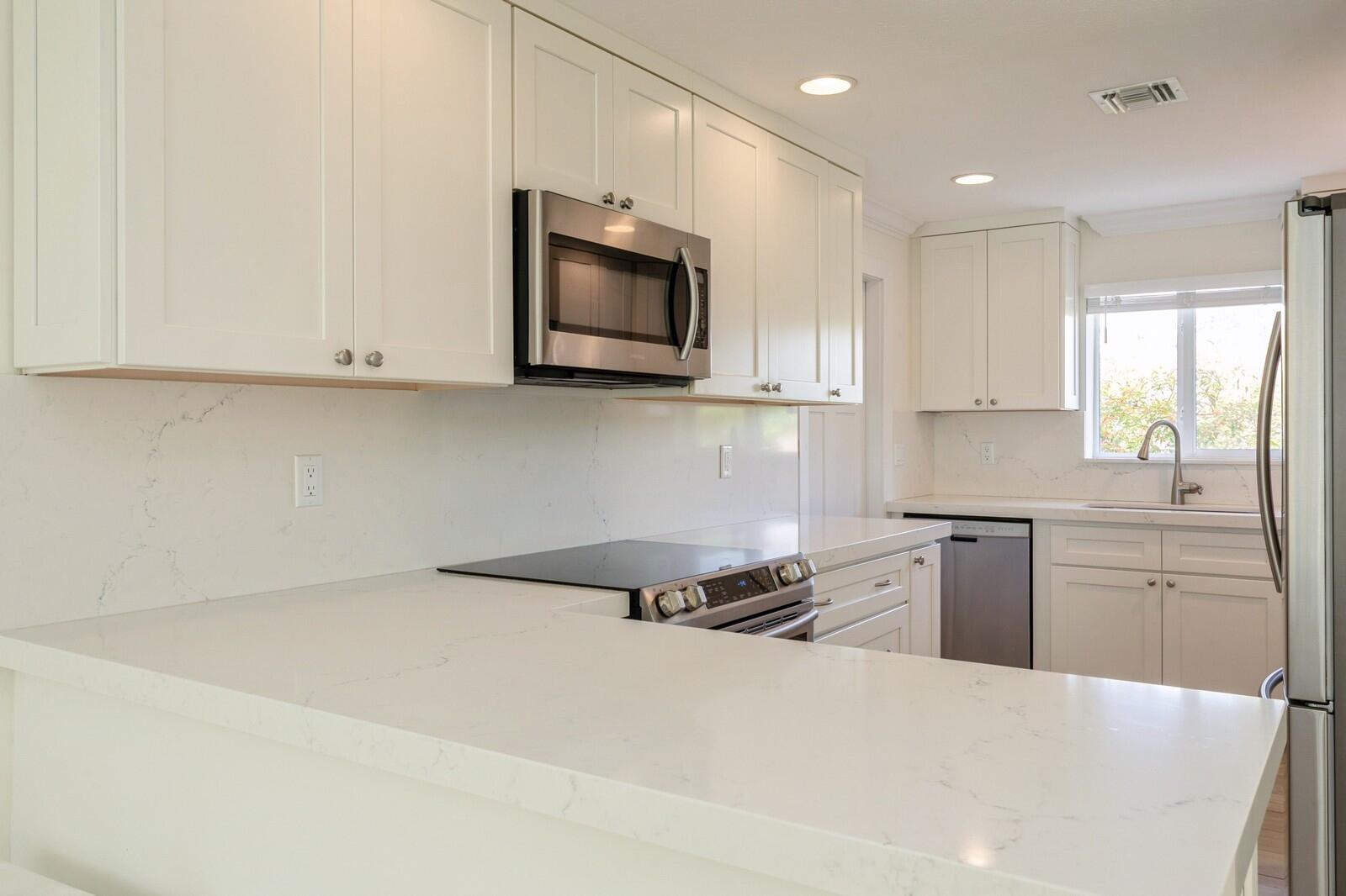 1615 Venus Avenue Jupiter, FL 33469 - Photo 8 of 27 07_Kitchen