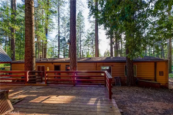 a view of outdoor space with deck and living area