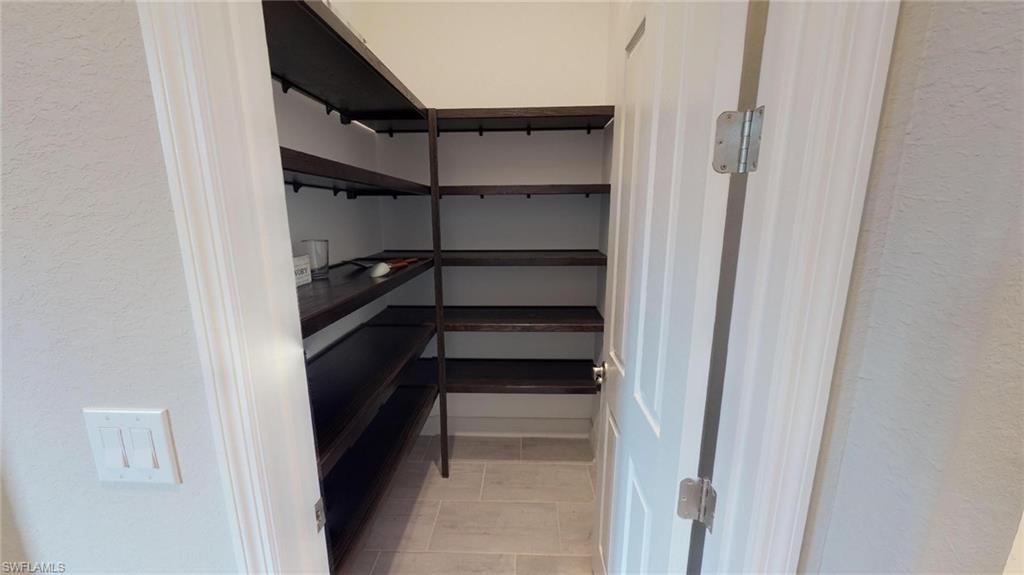 20259 Kingmont Drive Estero, FL 33928 - Photo 10 of 14 a view of walk in closet