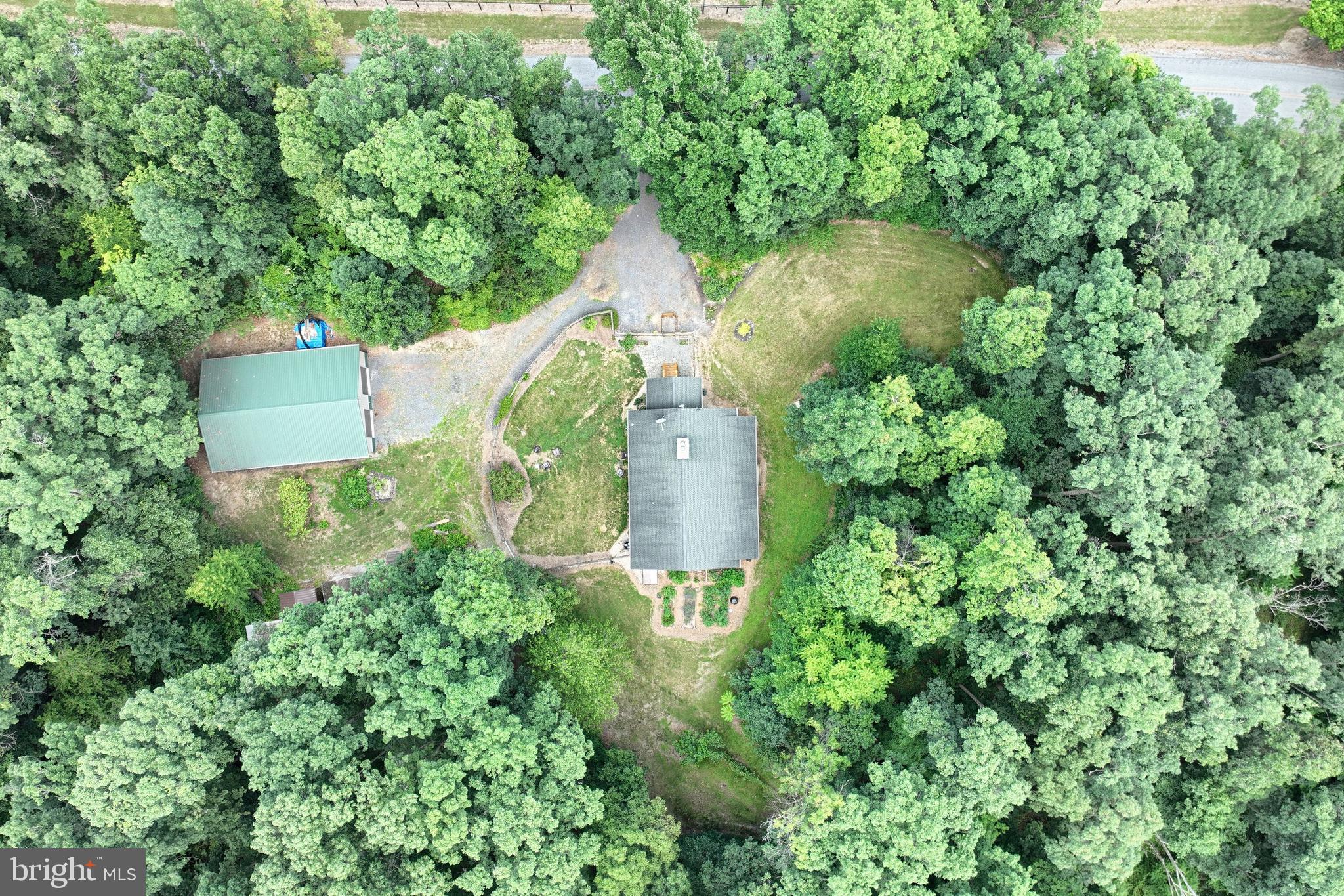 90 White Church Road York Springs, PA 17372 - Photo 25 of 31 an aerial view of a house with a yard and large trees