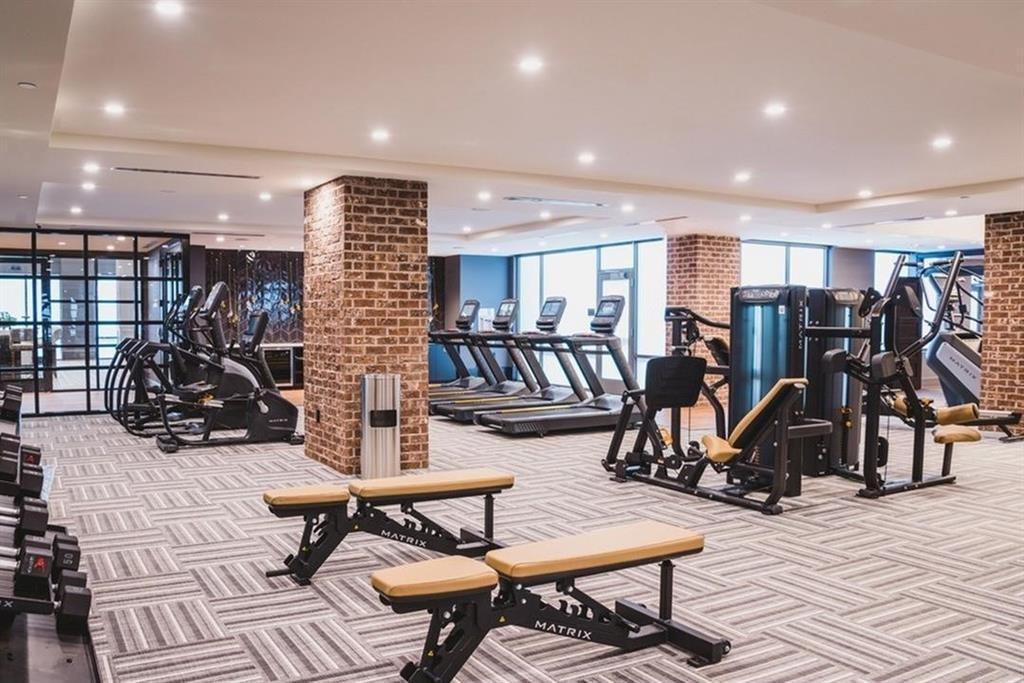 3651 Lenox Road Northeast, Unit B 05 Atlanta, GA 30305 - Photo 25 of 28 a view of a room with gym equipment