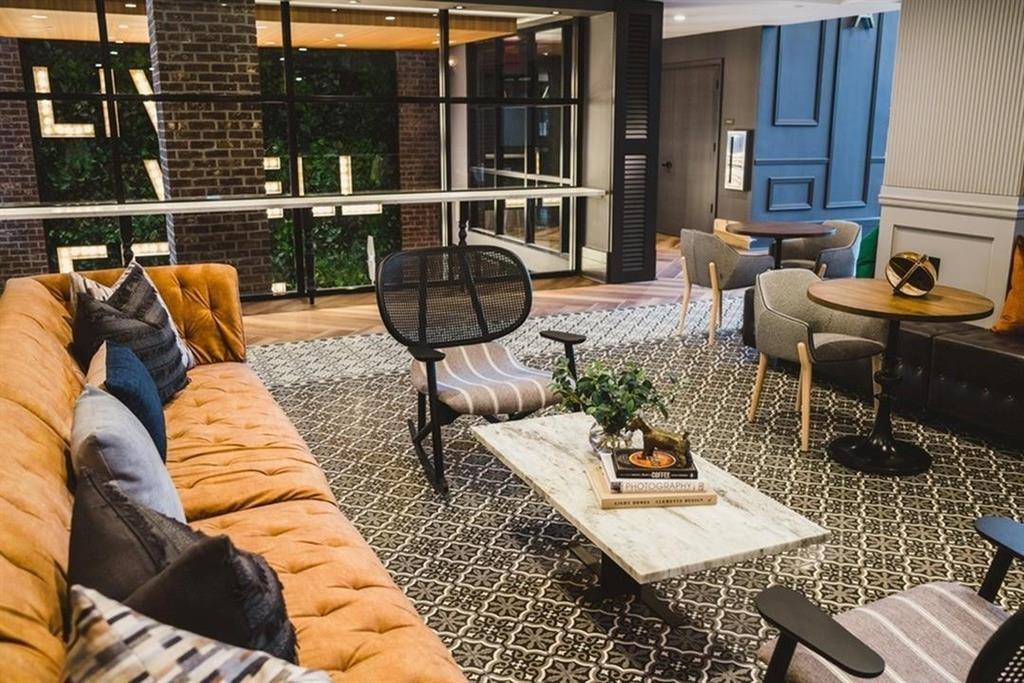 3651 Lenox Road Northeast, Unit B 05 Atlanta, GA 30305 - Photo 26 of 28 a view of balcony and patio with couches