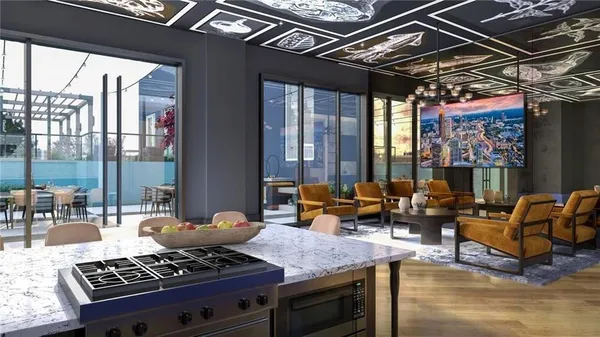 a living room with furniture a chandelier and pool table