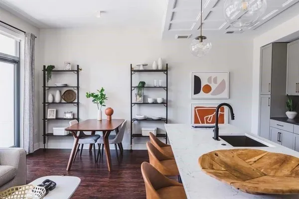 a kitchen with a stove and a microwave