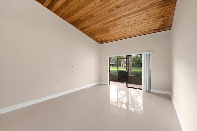 a view of an empty room with a balcony