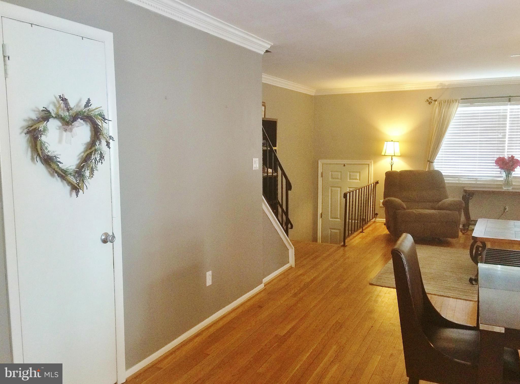 913 Elm Road Baltimore, MD 21227 - Photo 8 of 28 a view of hallway with furniture