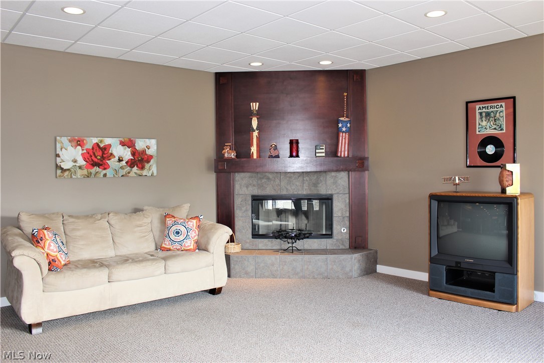 13720 Hale Road Burton, OH 44021 - Photo 24 of 35 Rec Room also includes a Sitting area and a gas Fireplace.