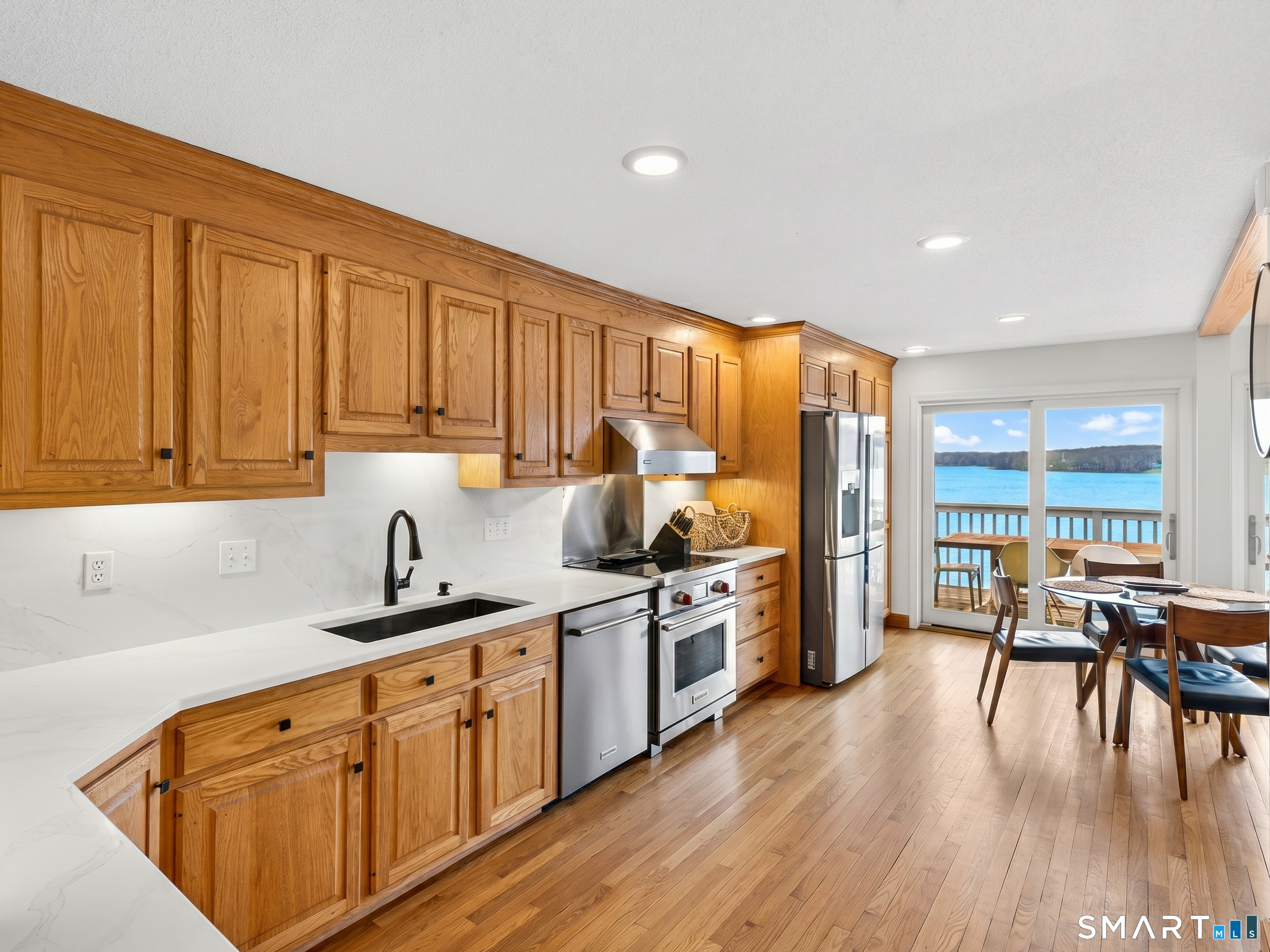 148 Old Colchester Road Salem, CT 06420 - Photo 11 of 40 Enjoy new quartz countertops, hardwood floors and top of the line appliances.