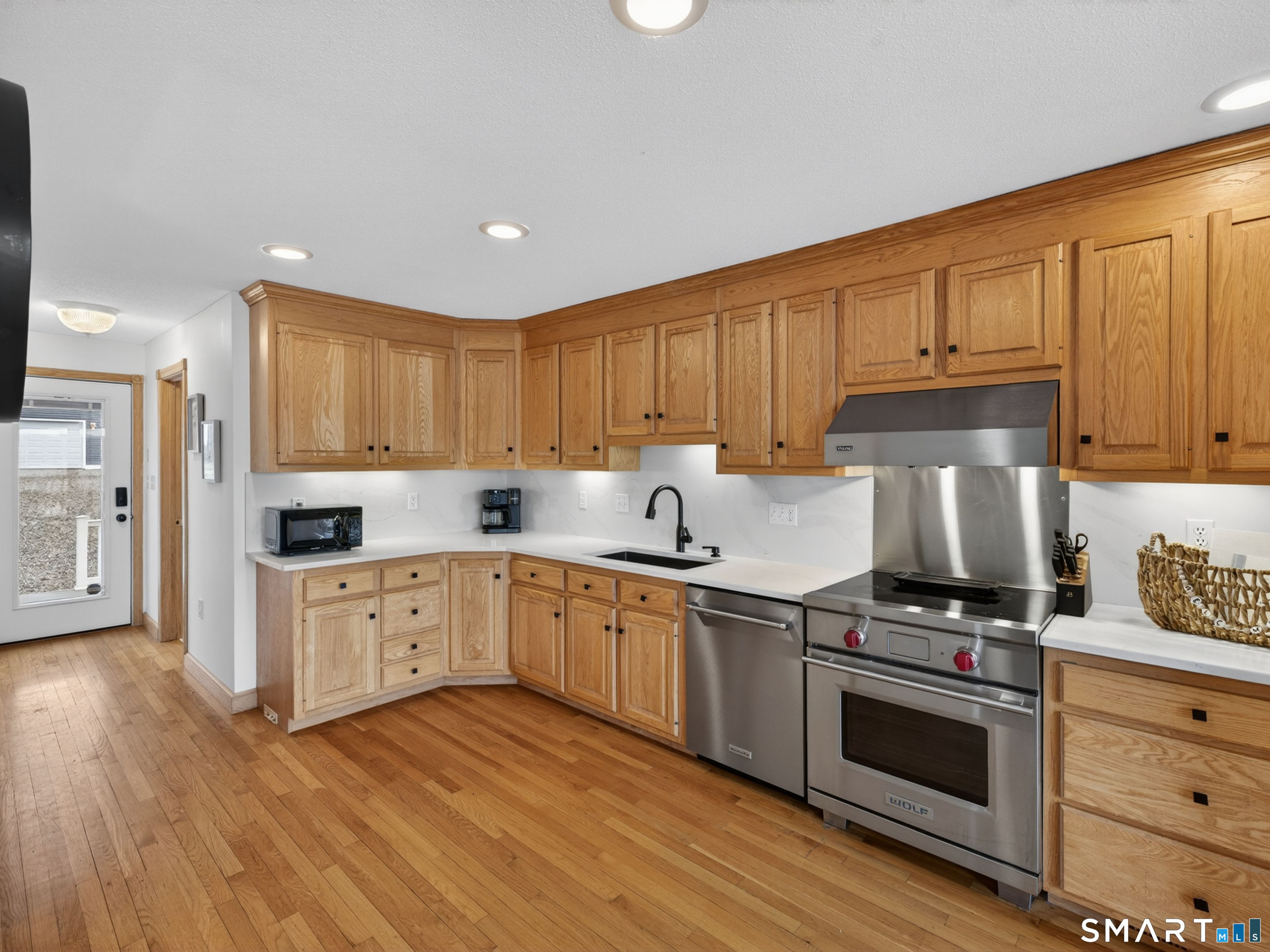 148 Old Colchester Road Salem, CT 06420 - Photo 12 of 40 Eat-in Kitchen has a Wifi Refrigerator, Wolf Induction Stove and Viking Hood.