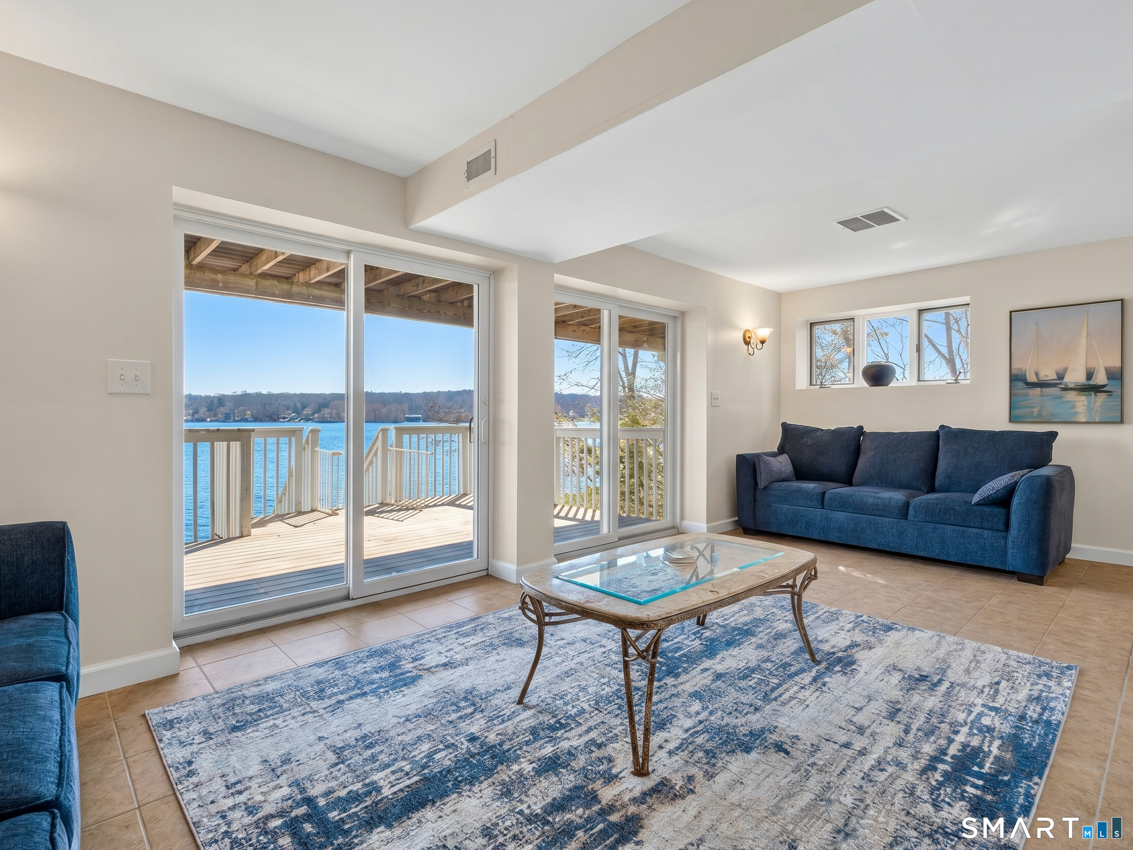 148 Old Colchester Road Salem, CT 06420 - Photo 29 of 40 Lower Level Family Room with Covered Walkout Deck