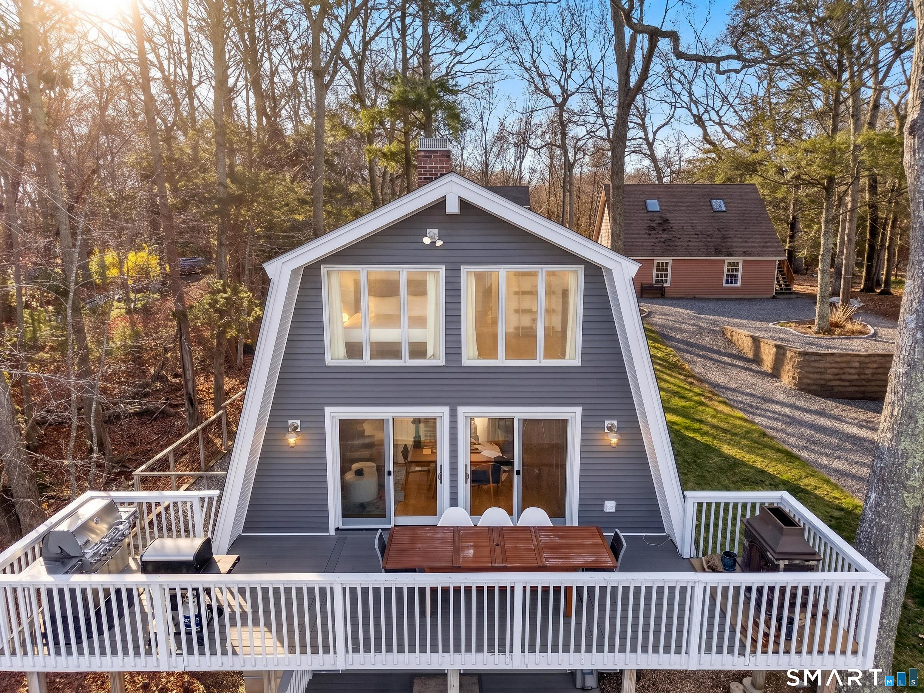 148 Old Colchester Road Salem, CT 06420 - Photo 10 of 40 The Upper Deck connects to the main level's open eat-in kitchen and den area, so feel free to enjoy that morning coffee outside...