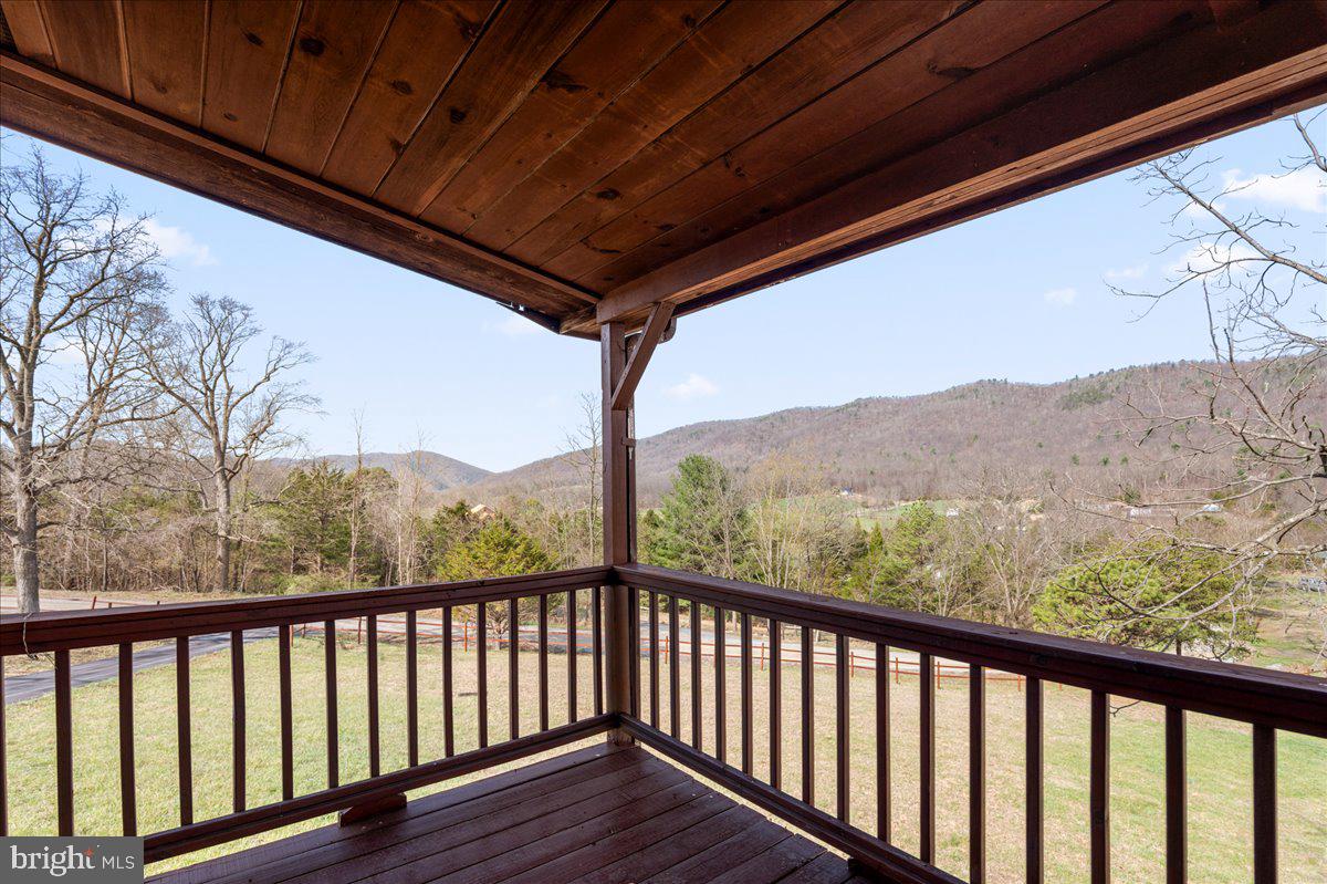325 Coyote Run Mathias, WV 26812 - Photo 34 of 40 a view of a balcony with furniture