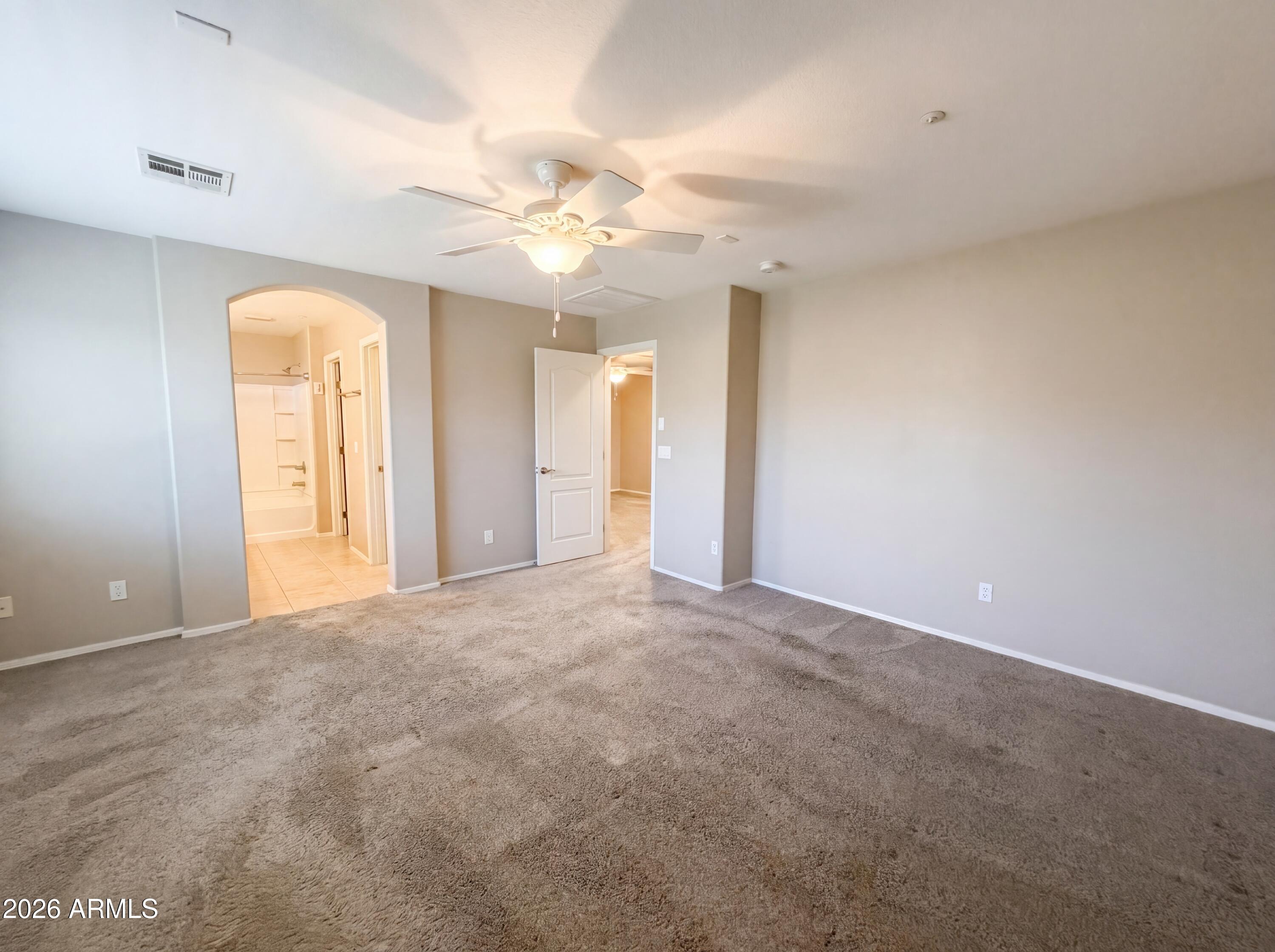 1565 East Hopkins Road Gilbert, AZ 85295 - Photo 7 of 29 a view of an empty room with a window