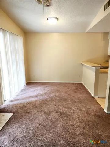 en empty room with windows