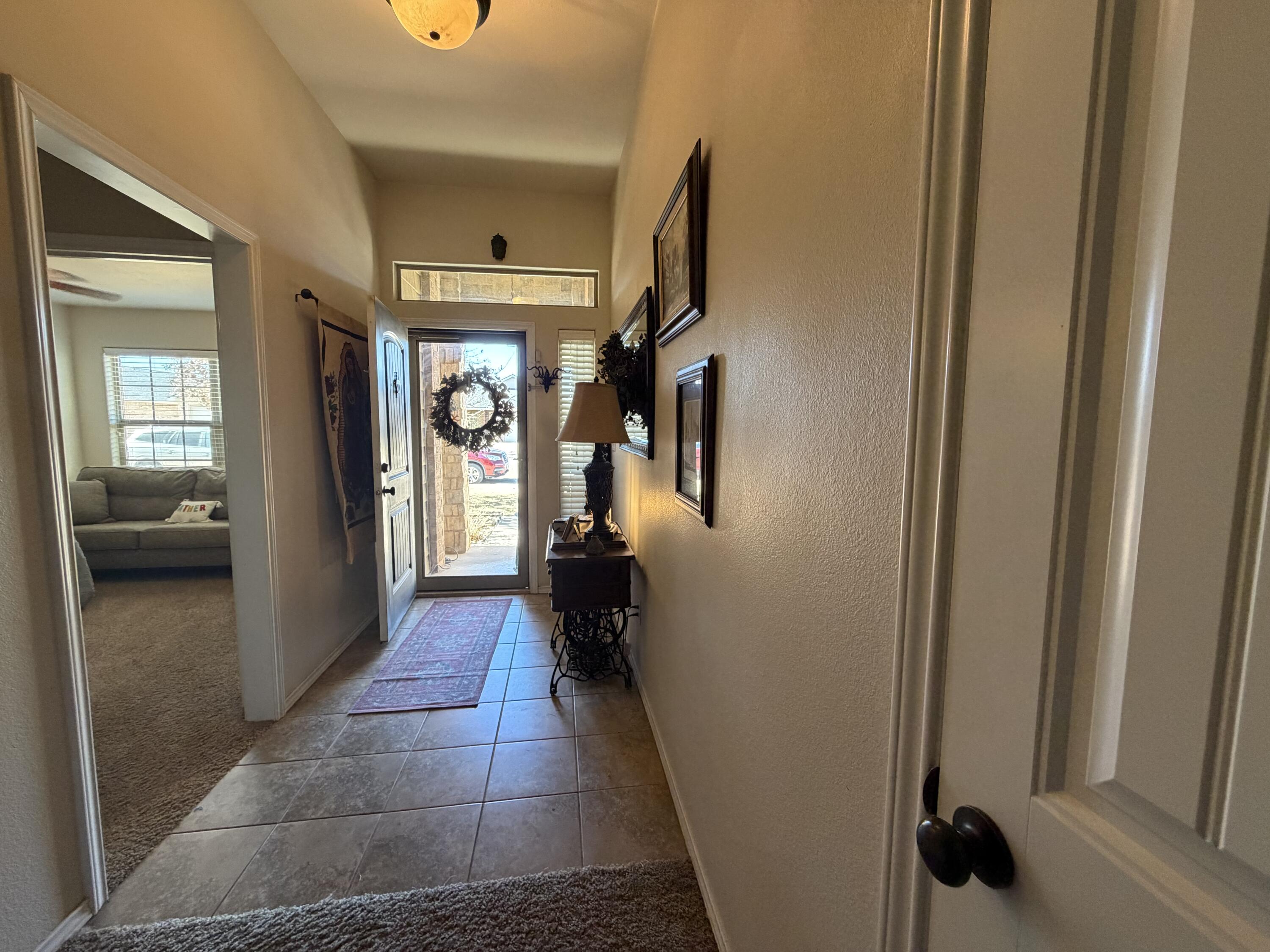 9309 Rochester Avenue Lubbock, TX 79424 - Photo 3 of 24 66DDDBA7-4521-42FC-858C-0956D5CA1090