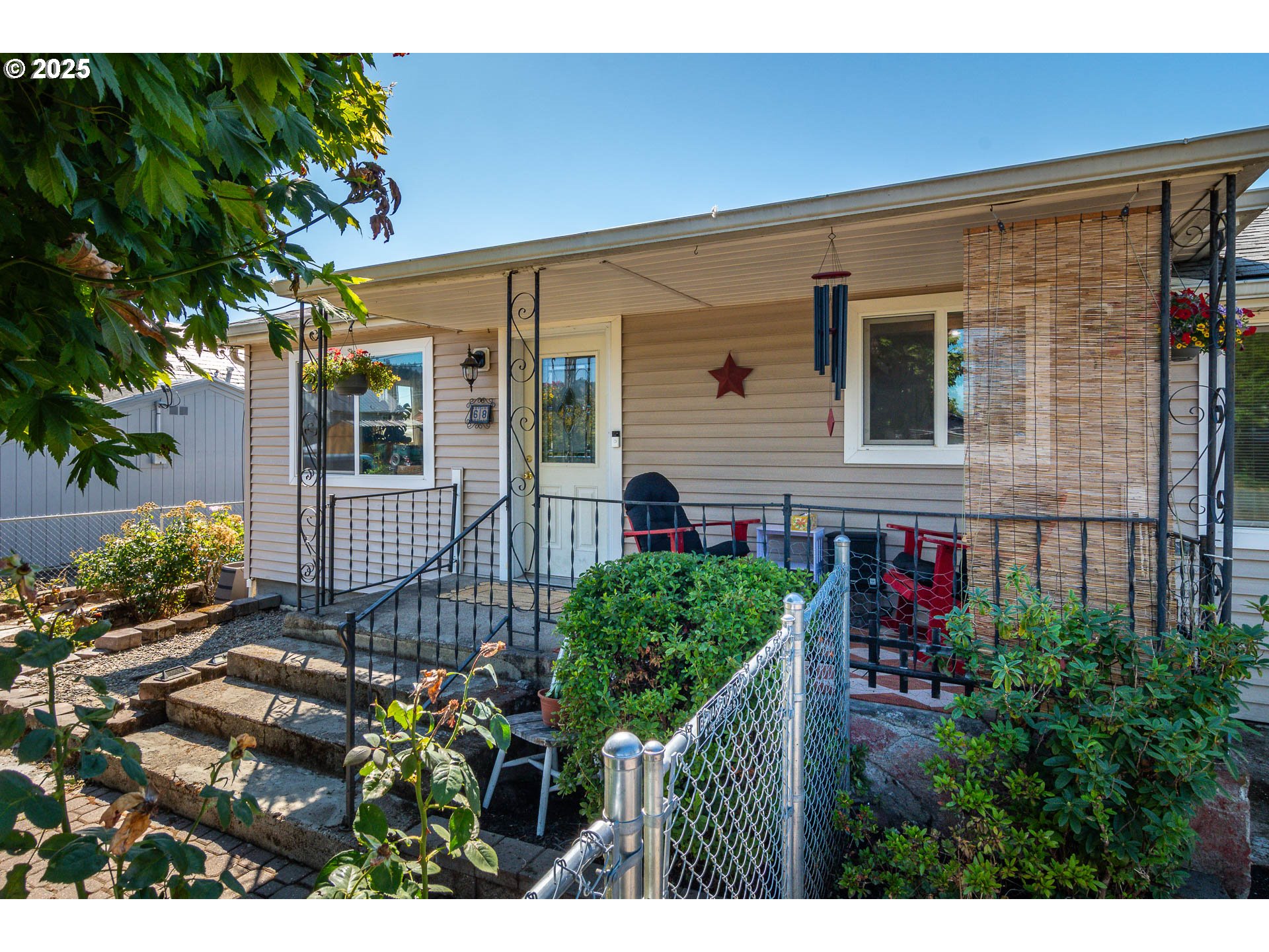 68 Rose Avenue Winston, OR 97496 - Photo 1 of 43 a view of a house with a flower garden