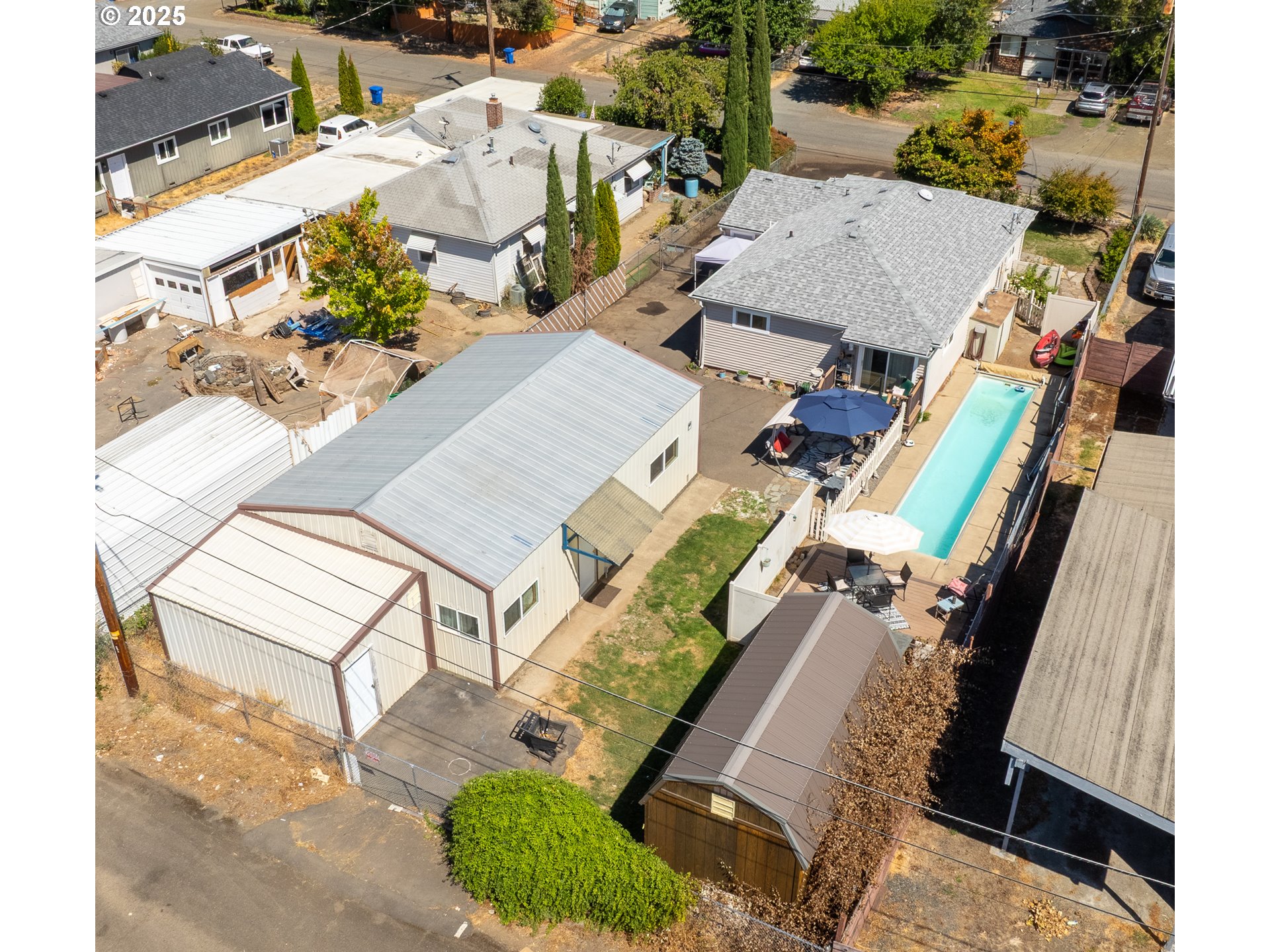 68 Rose Avenue Winston, OR 97496 - Photo 2 of 43 an aerial view of a residential houses with outdoor space