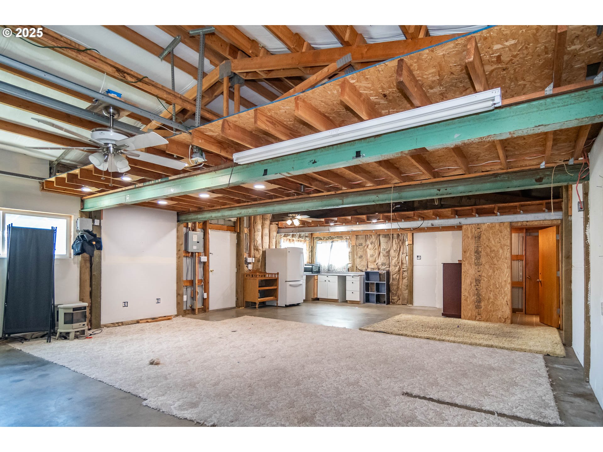 68 Rose Avenue Winston, OR 97496 - Photo 27 of 43 a view of empty room with wooden floor