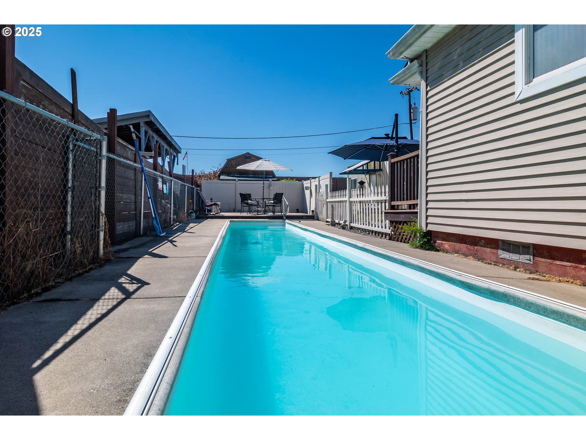 68 Rose Avenue Winston, OR 97496 - Photo 31 of 43 a view of a house with pool and wooden floor