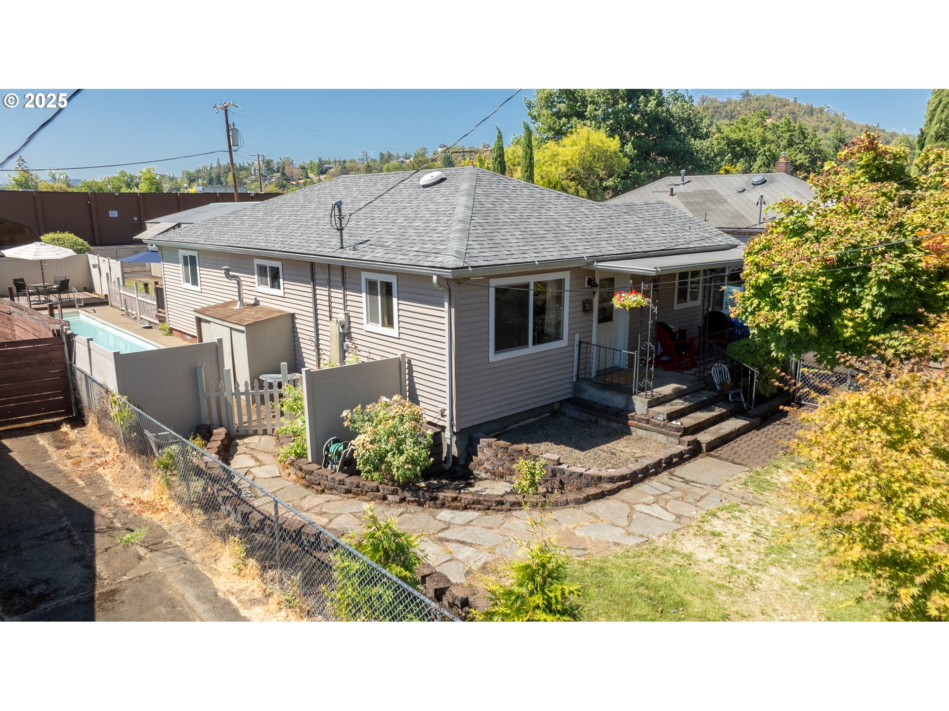 68 Rose Avenue Winston, OR 97496 - Photo 33 of 43 a view of a house with backyard and sitting area