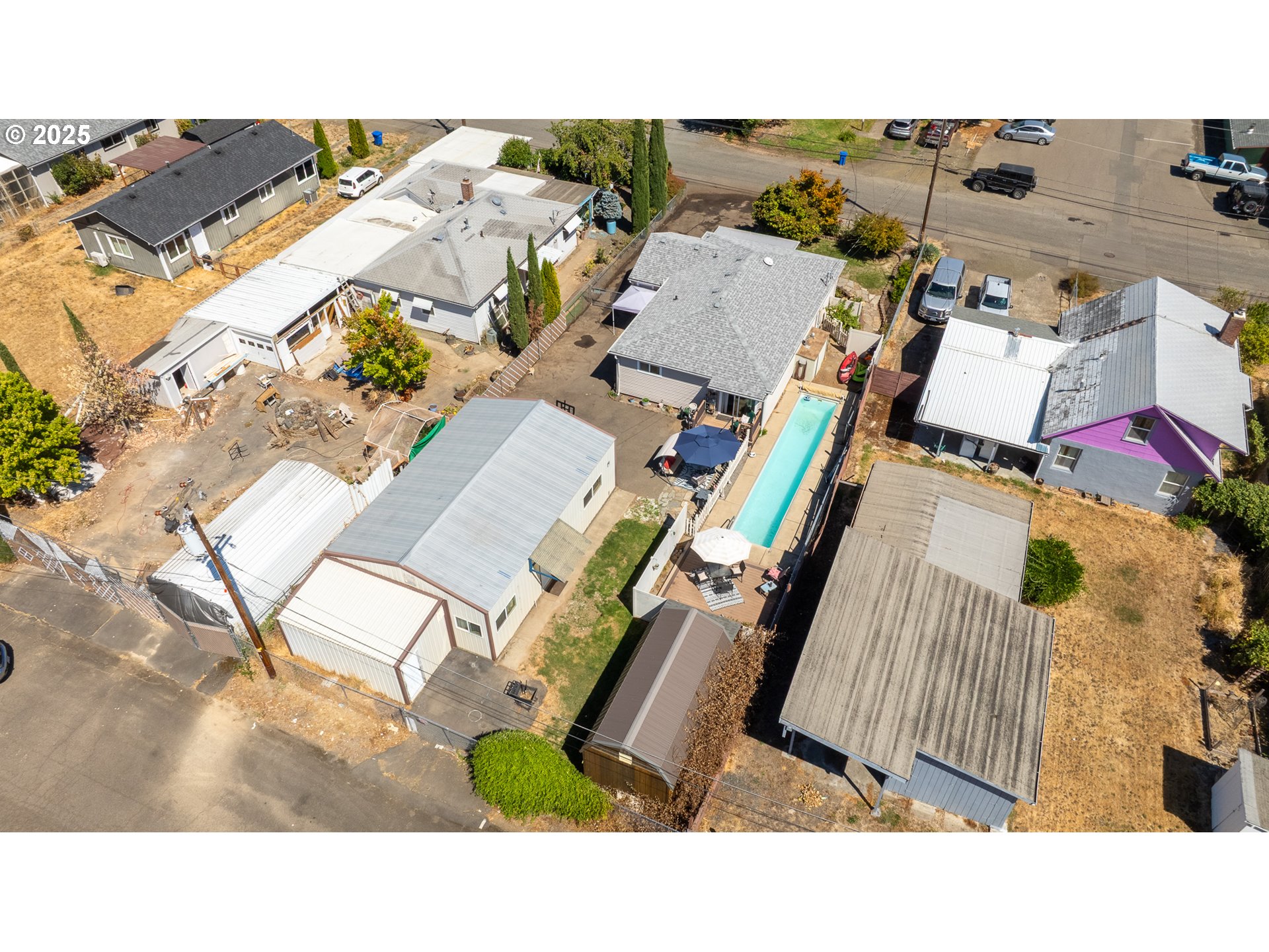 68 Rose Avenue Winston, OR 97496 - Photo 34 of 43 an aerial view of a house with a yard