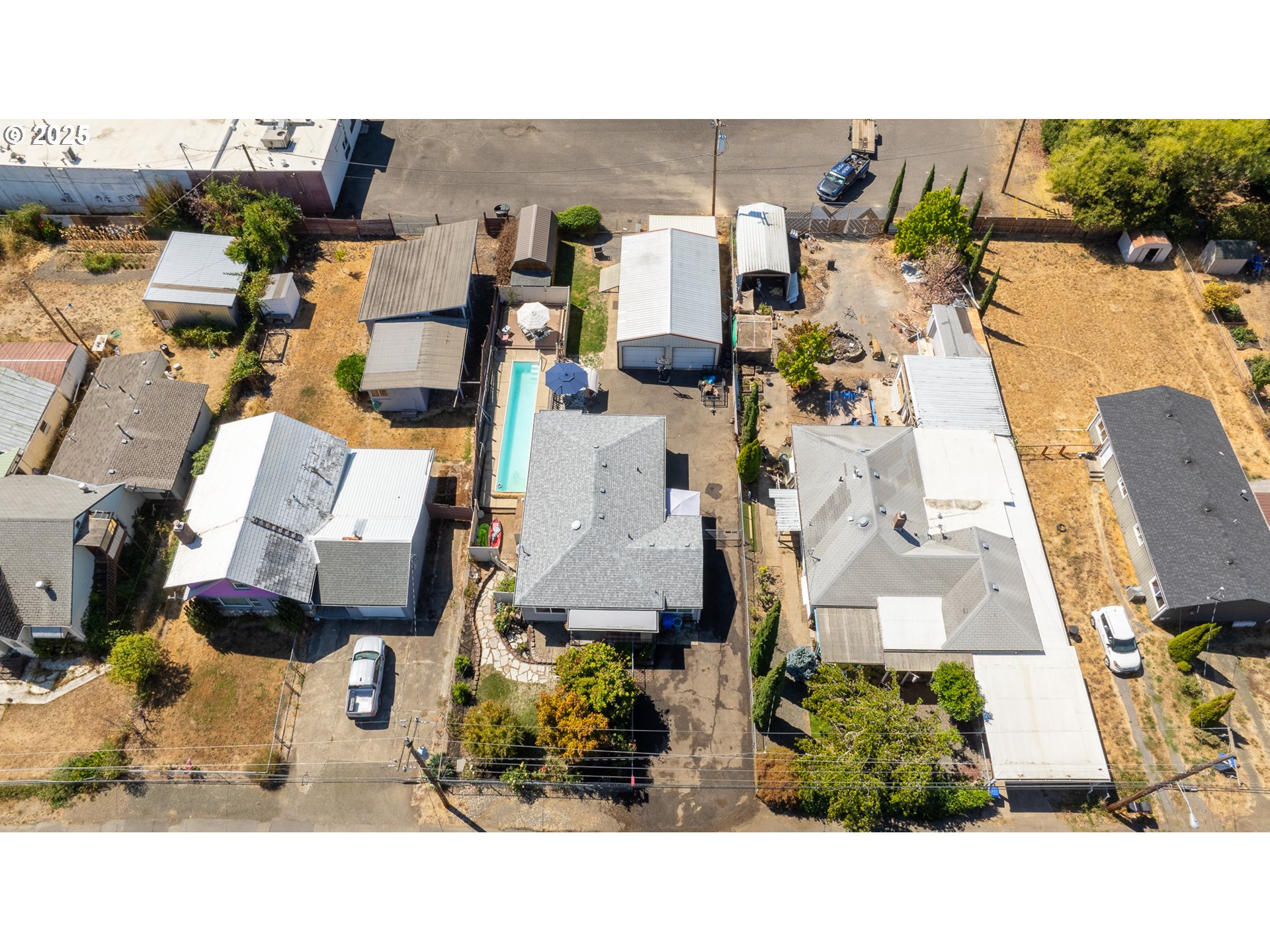 68 Rose Avenue Winston, OR 97496 - Photo 35 of 43 an aerial view of a house with a yard