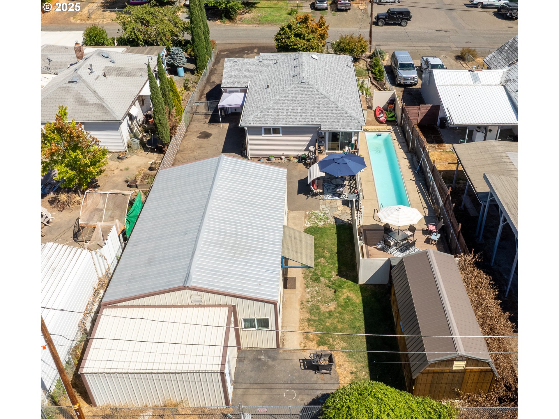 68 Rose Avenue Winston, OR 97496 - Photo 37 of 43 an aerial view of a house with a yard