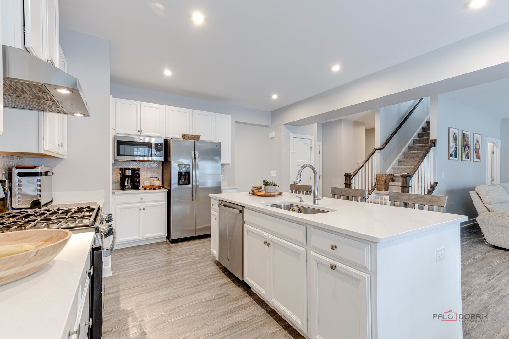 1799 Overview Circle Antioch, IL 60002 - Photo 12 of 38 a kitchen with a sink stove and refrigerator
